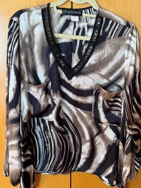 Talk of the Walk Animal Print V-Neck with lace trim detail